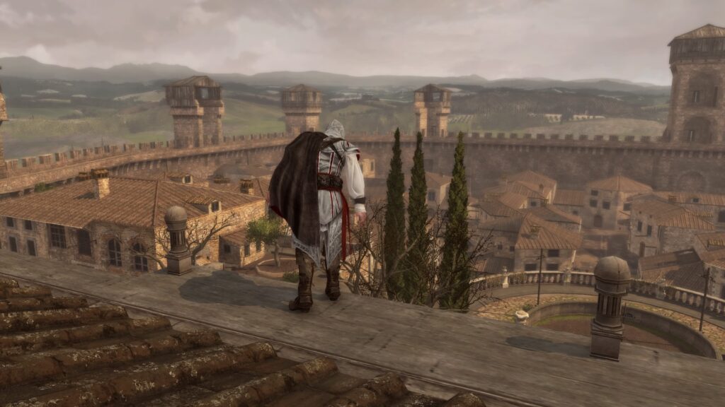 Ezio auditore standing on the top of a building overlooking the city, he peeks at the bottom